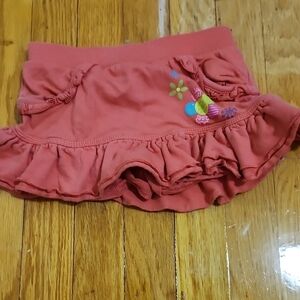 Coral Ruffled Skirt with Floral Embroidery